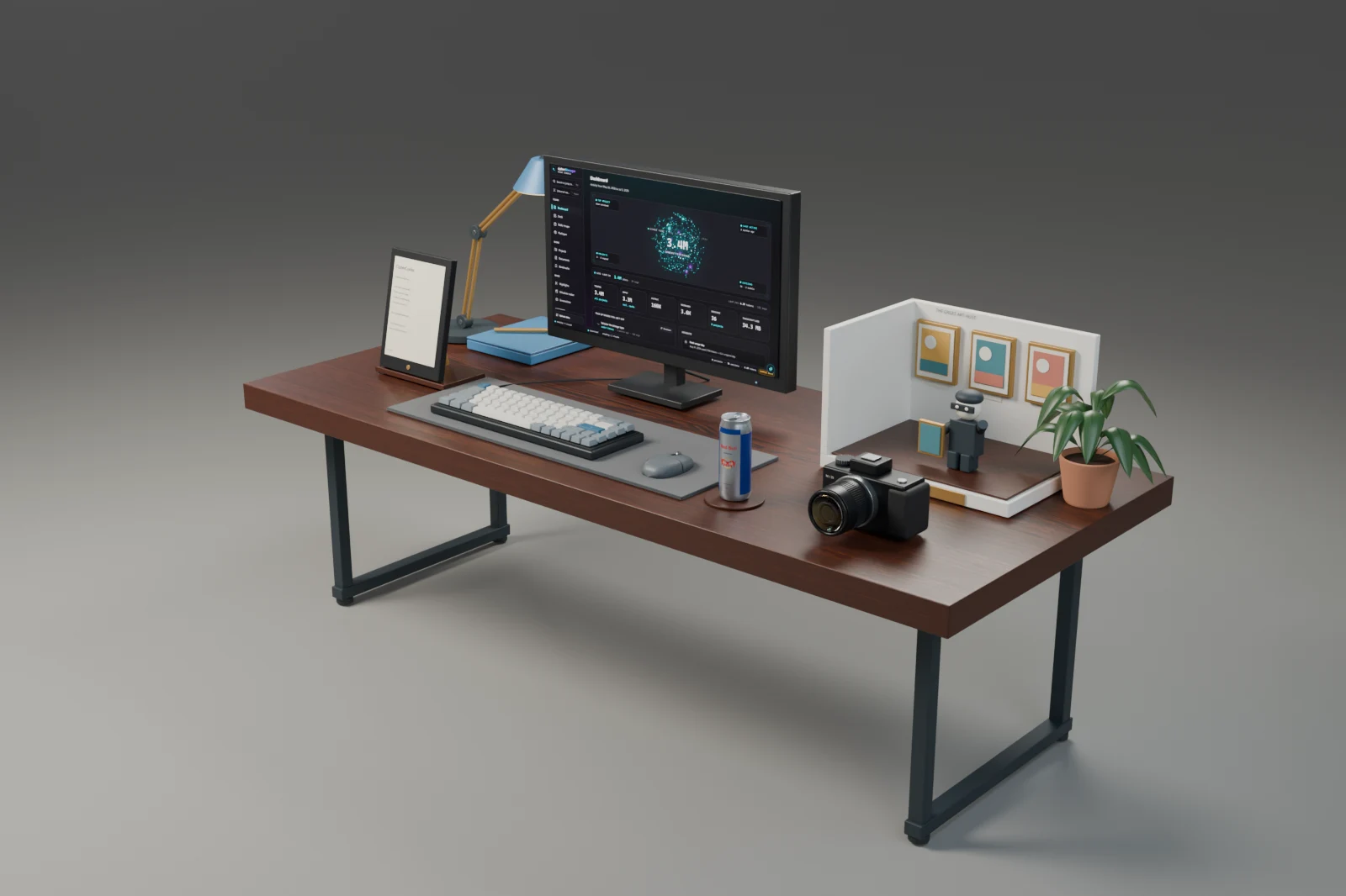 A walnut workshop desk with a monitor, e-reader, miniature art gallery, camera, plant, and energy drink.