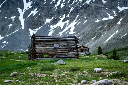 A cabin below the peaks — Colorado